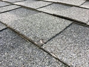 asphalt shingles hail damage roofing company repair services